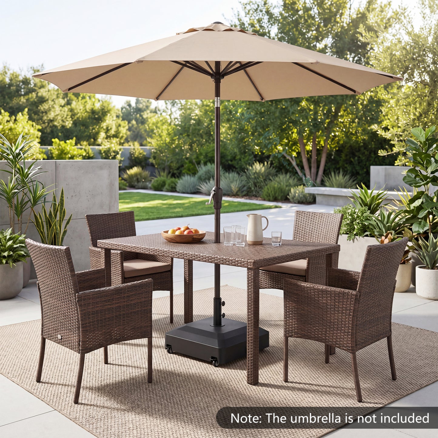 Black outdoor fillable umbrella base with wheels, water and sand weighted stand for outdoor umbrella support.