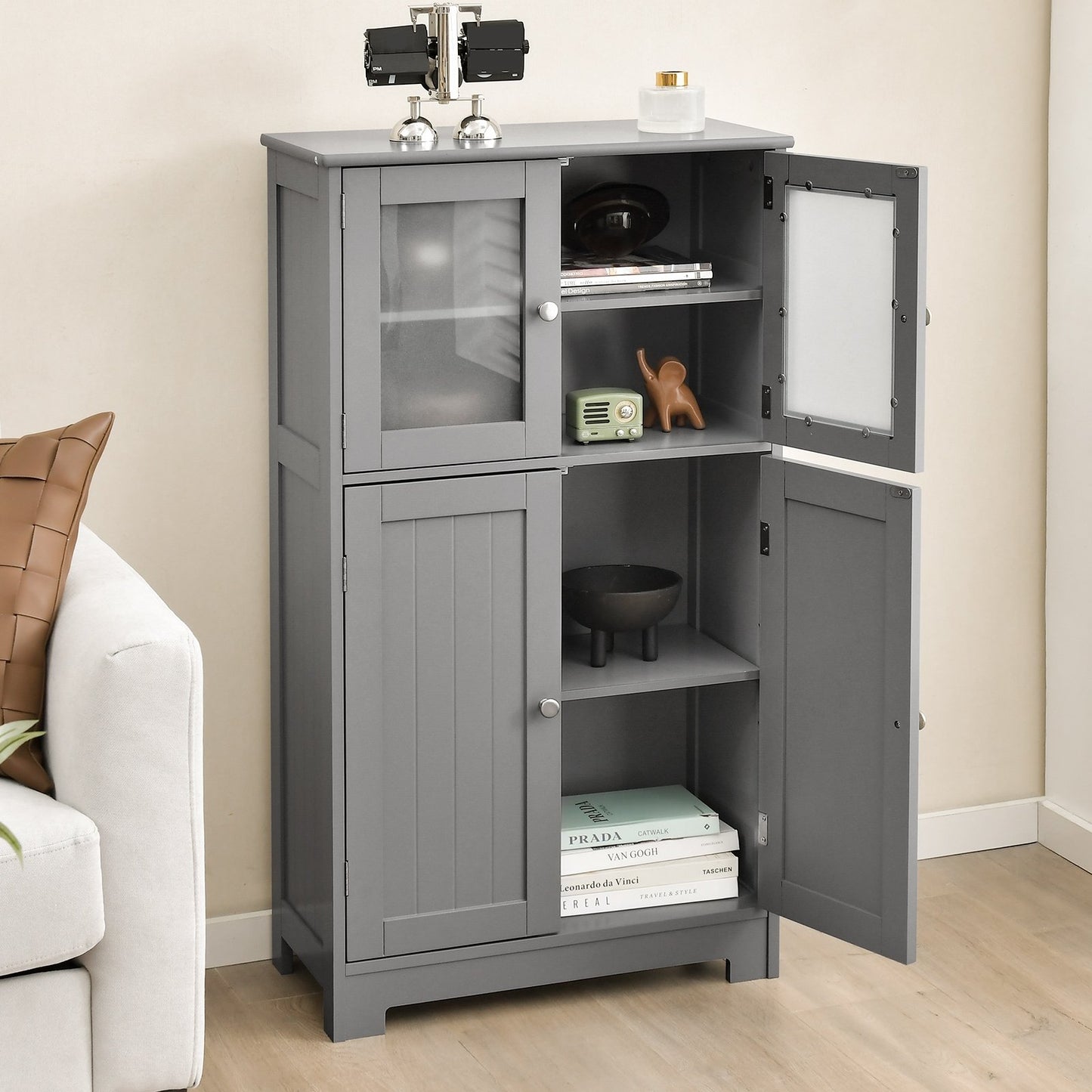 Gray bathroom floor storage locker with doors and adjustable shelf, kitchen cabinet for organized bathroom or kitchen use.