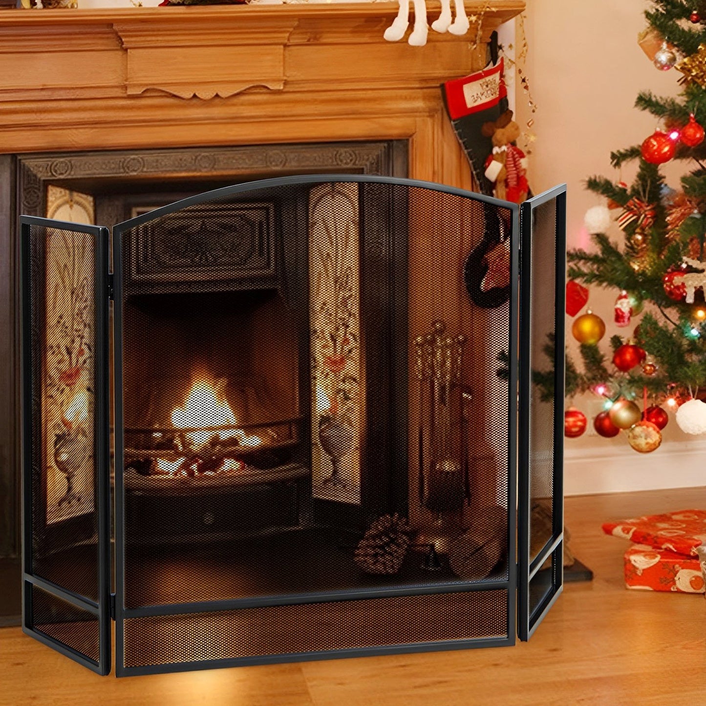 Black 3-panel foldable fireplace screen with wrought metal mesh, designed for outdoor heating or fireplace safety.