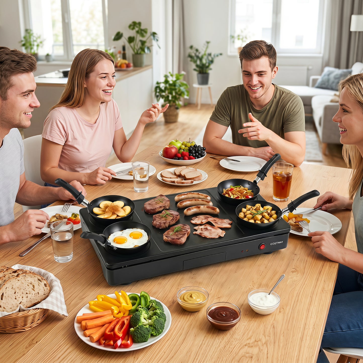 Electric grill and griddle from Wilsons Home Store with four nonstick woks and wooden spatulas, ideal for pancakes and cooking.