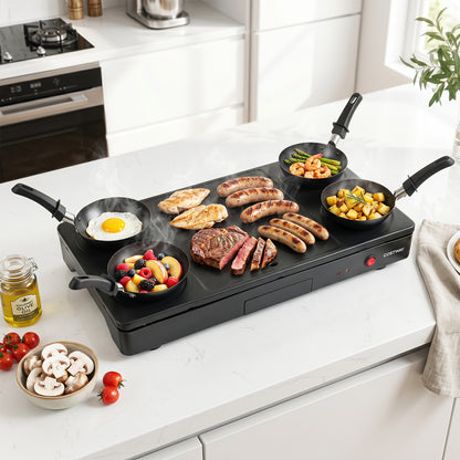 Electric grill and griddle with 4 nonstick woks and wooden spatulas, ideal for pancakes and versatile cooking.