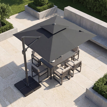 Beige 10-foot aluminum patio umbrella with cantilever design and sturdy base, ideal for outdoor shade and sun protection.