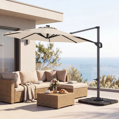 Beige 10 ft cantilever patio umbrella with solar LED lights and 220 lbs base for outdoor shade and sun protection.