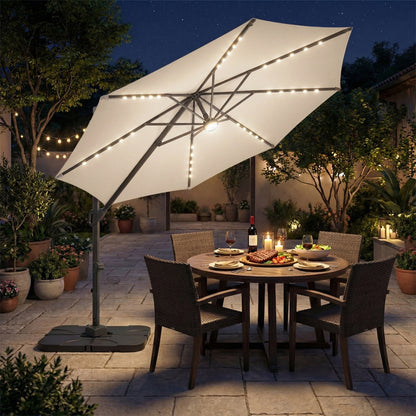 Beige 10 ft cantilever patio umbrella with solar LED lights and heavy base, providing shade for outdoor spaces.