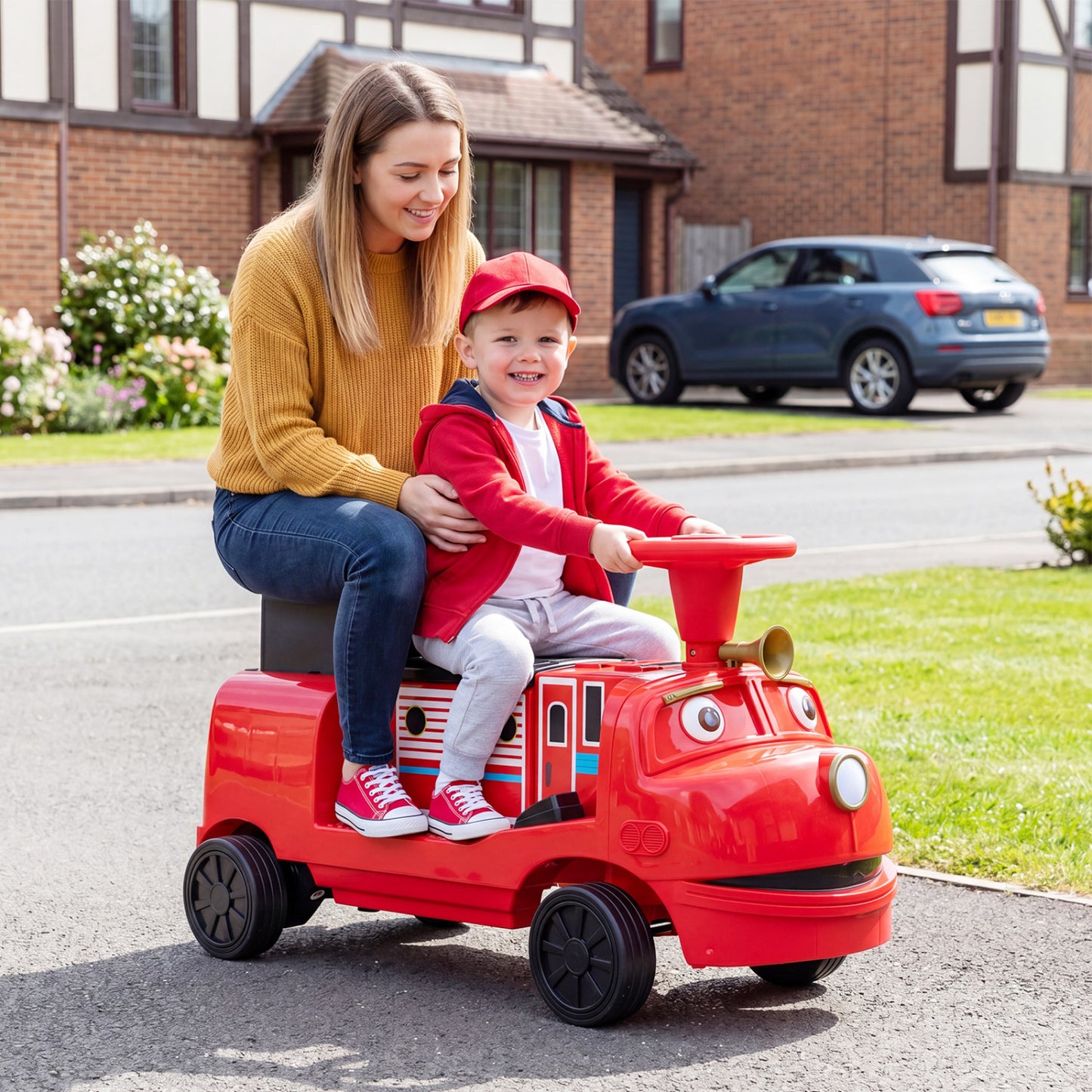 Blue 12V kids ride-on train with three seats and detachable carriage, licensed Chuggington toy for children, powered ride-on toy.