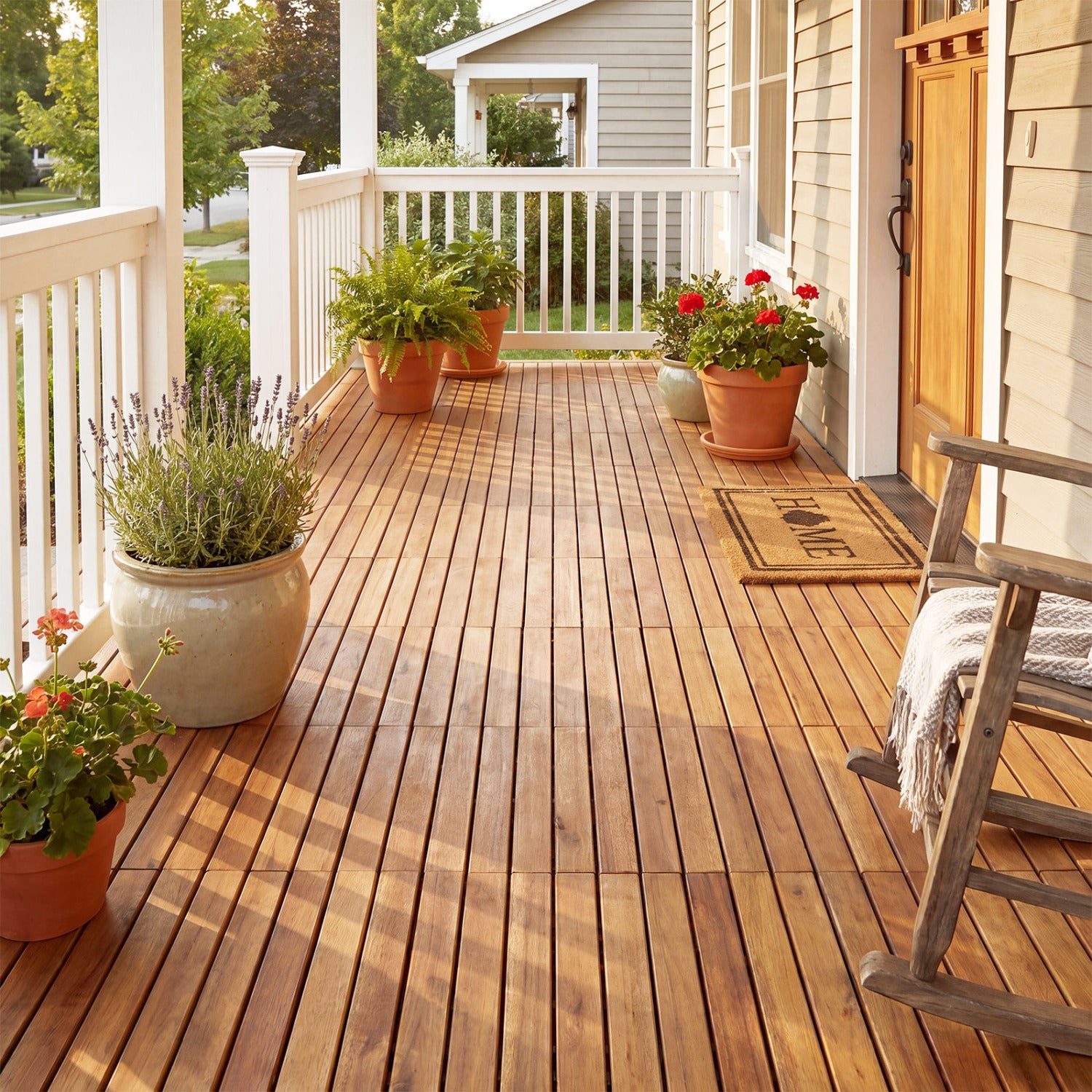 Natural acacia wood interlocking deck tiles, 12x12 inch, 54-piece outdoor flooring from Wilsons Home Store shown assembled.