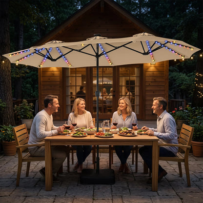 Beige 13 ft double-sided patio umbrella with 108 LED lights and included base, ideal for outdoor shade and ambiance.