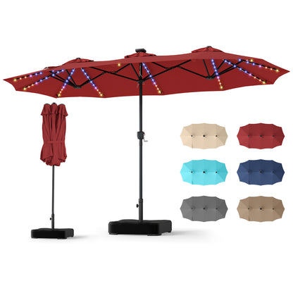 Beige 13 ft double-sided patio umbrella with 108 LED lights and base, outdoor shade by Wilsons Home Store.