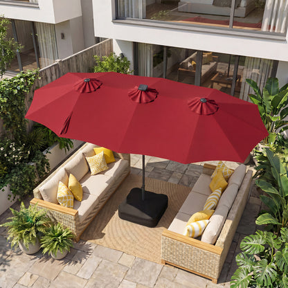 Beige 13-foot double-sided patio umbrella with 108 LED lights and base, ideal for outdoor shade and relaxation.