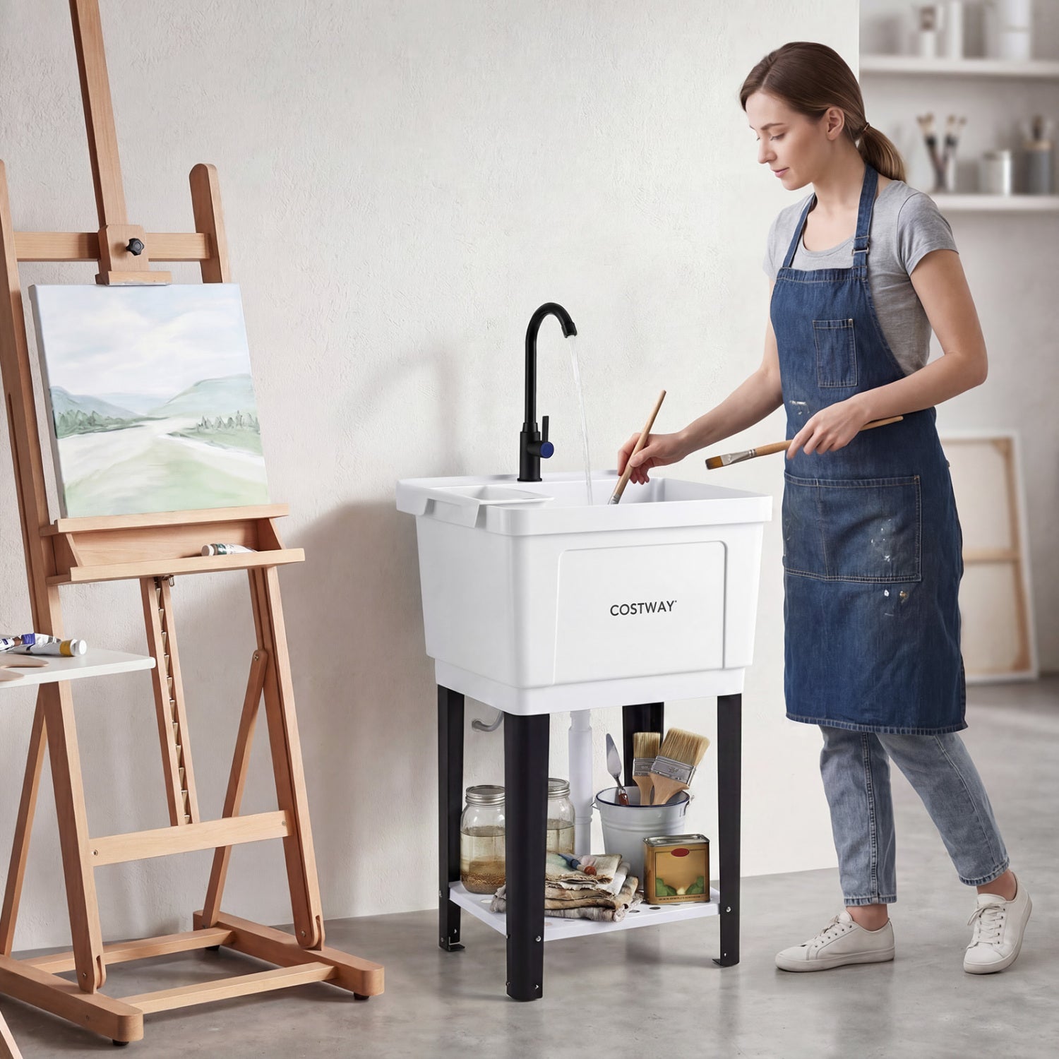 14.5-gallon utility sink with rotating faucet and adjustable legs, ideal for outdoor laundry and garage use by Wilsons Home Store.