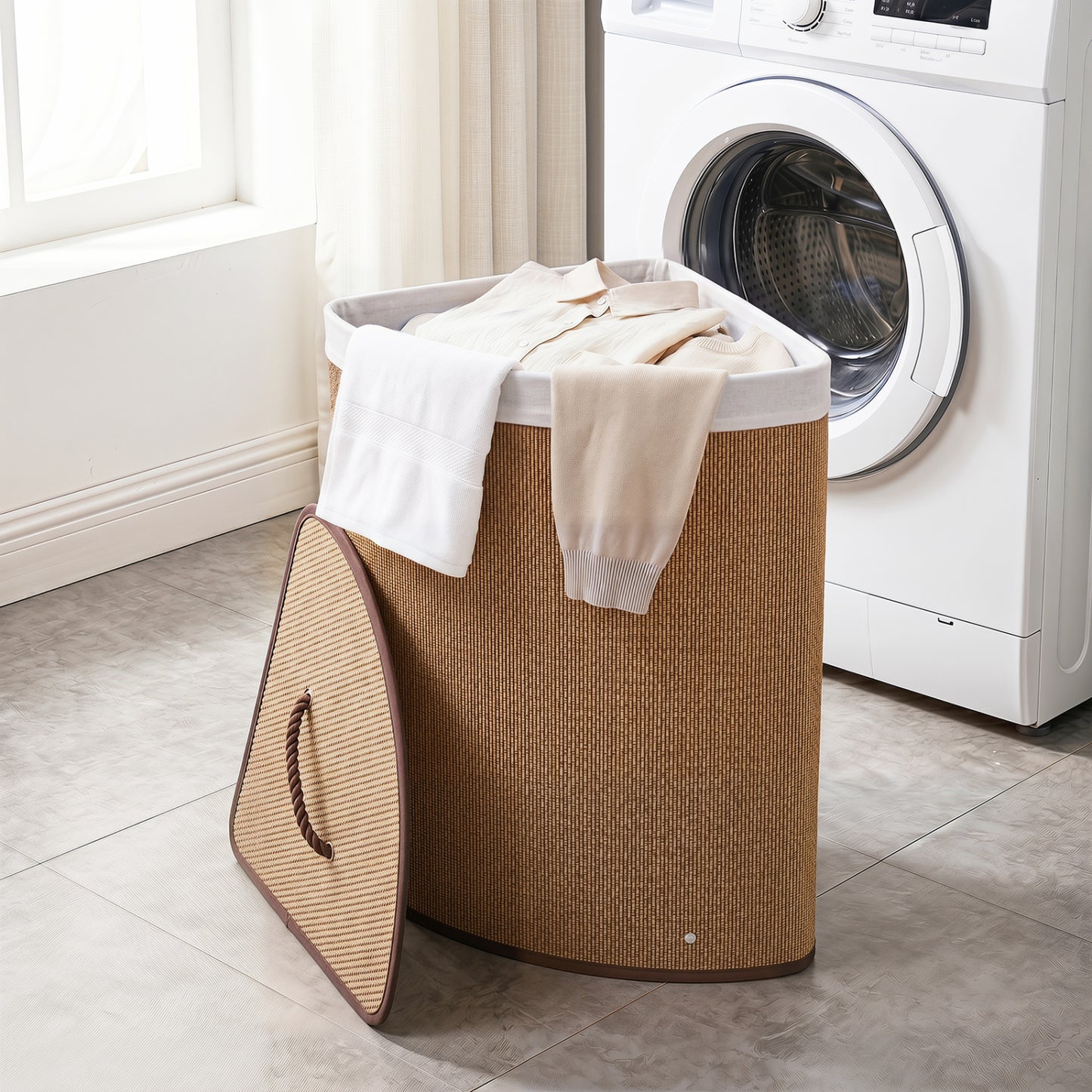 Black 15-gallon bamboo laundry hamper with removable liner, rectangular design, sturdy construction, ideal for bathroom storage.