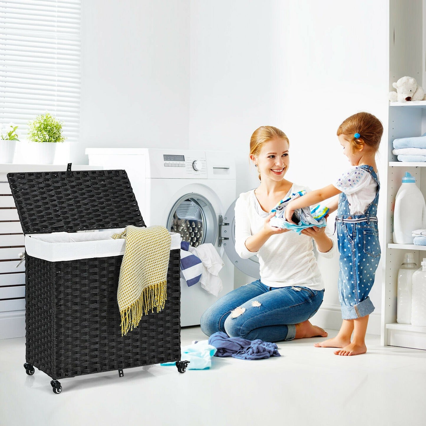 Black laundry hamper with wheels and lid, plastic bath storage basket for laundry organization and easy mobility.