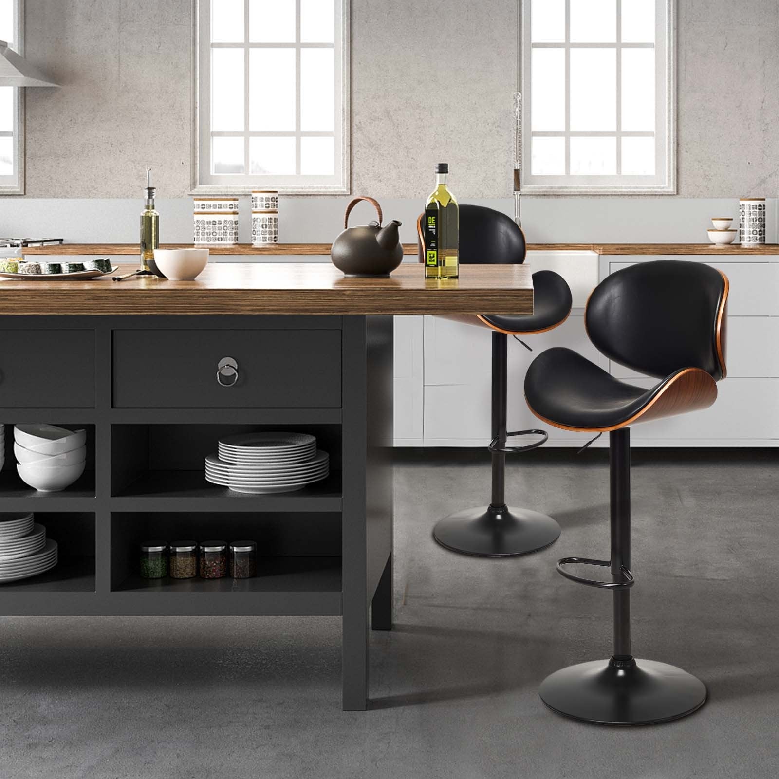 Set of 2 adjustable swivel PU leather bar stools with curved footrests, modern kitchen and dining furniture by Wilsons Home Store