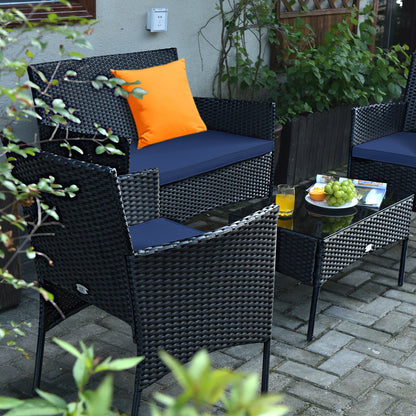 4 Pieces Patio Rattan Cushioned Sofa Set with Tempered Glass Coffee Table-Navy and off White