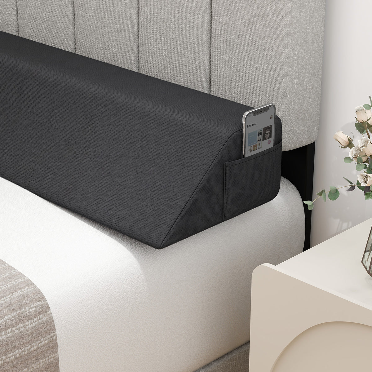 Full-size bed wedge pillow with storage bag, designed for bedroom comfort and support, by Wilsons Home Store.