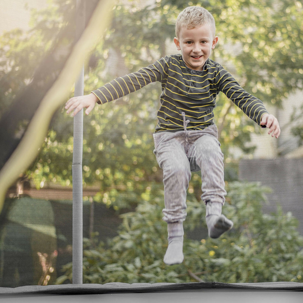 10ft weather-resistant trampoline safety enclosure net by Wilsons Home Store, with mesh and zipper for outdoor trampoline safety.