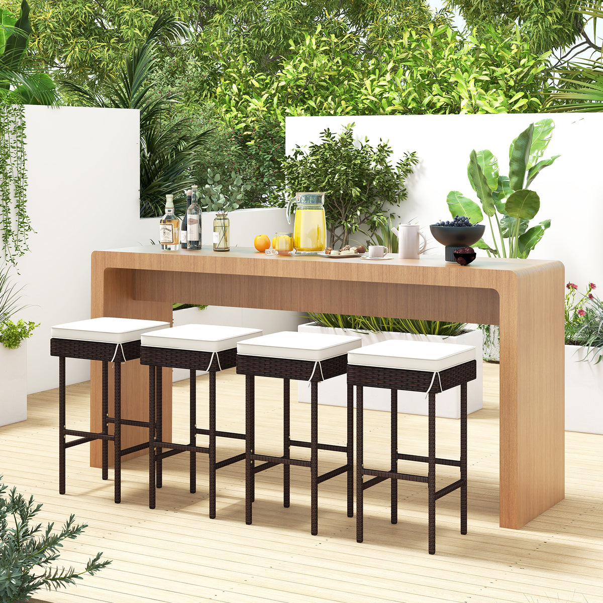 Set of 2 or 4 outdoor rattan barstools with footrests and soft cushions for patio or balcony seating, by Wilsons Home Store.