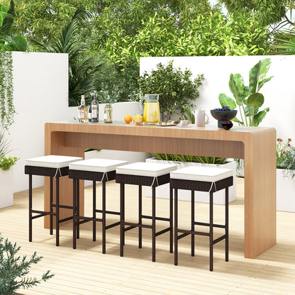 Set of 2 or 4 outdoor rattan barstools with footrests and soft cushions for patio or balcony seating, by Wilsons Home Store.