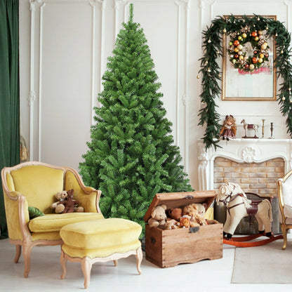 7.5 ft PVC artificial Christmas tree with hinged branches, decorated with green foliage for holiday decor.