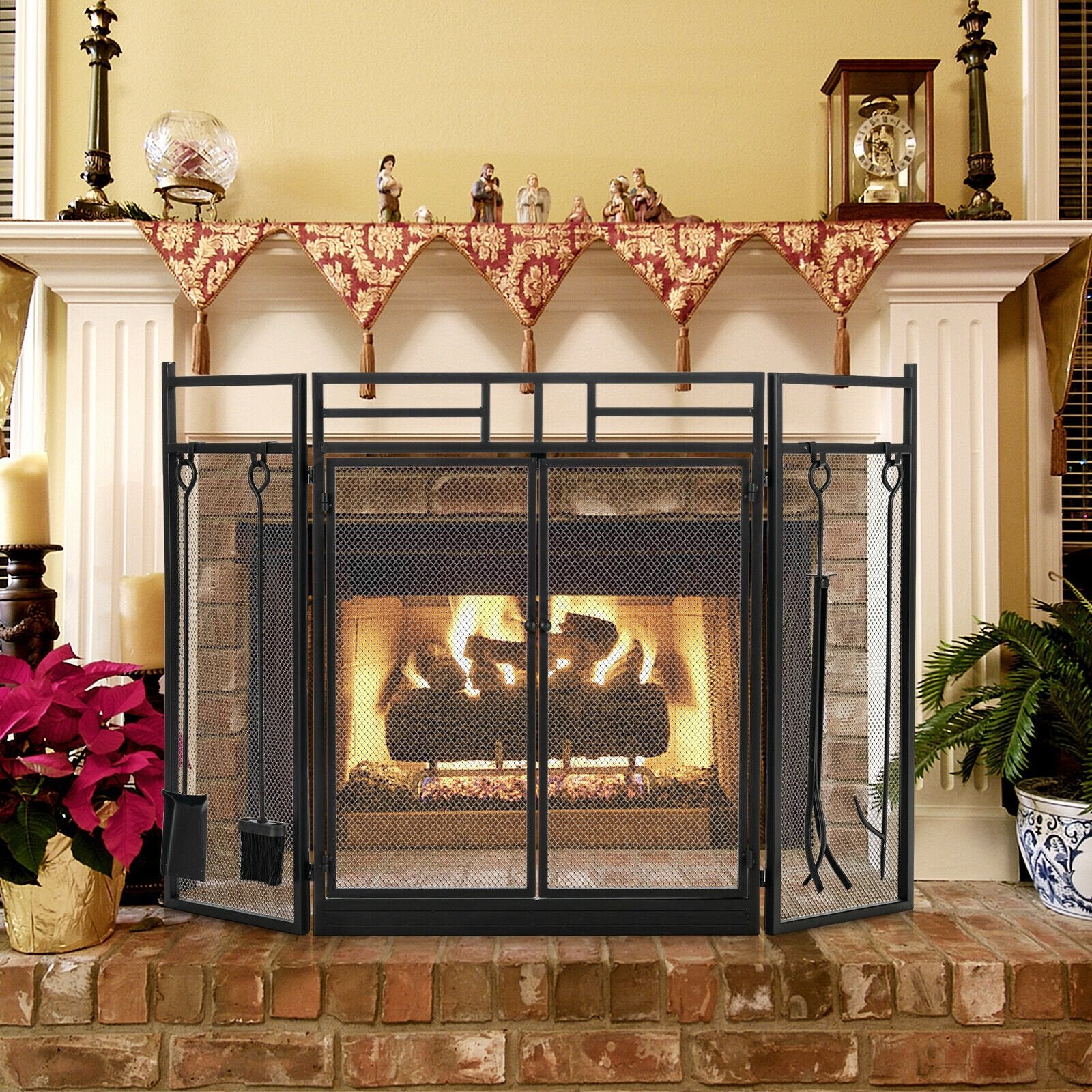 Black 3-panel wrought iron fireplace screen with four tools, designed for outdoor heating and fireplace safety.
