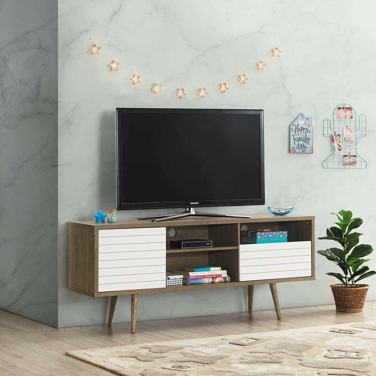 Mid-century modern Wilsons Home Store TV stand with storage shelves, designed for 65-inch TVs, in a contemporary living room setting