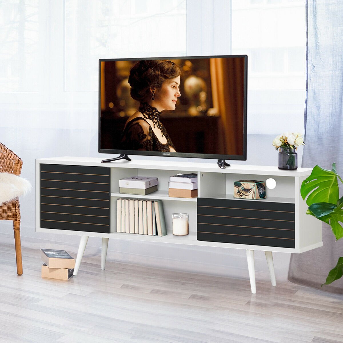 Mid-century modern TV stand with storage shelves for 65-inch TVs, featuring wood finish and open compartments for living room decor.