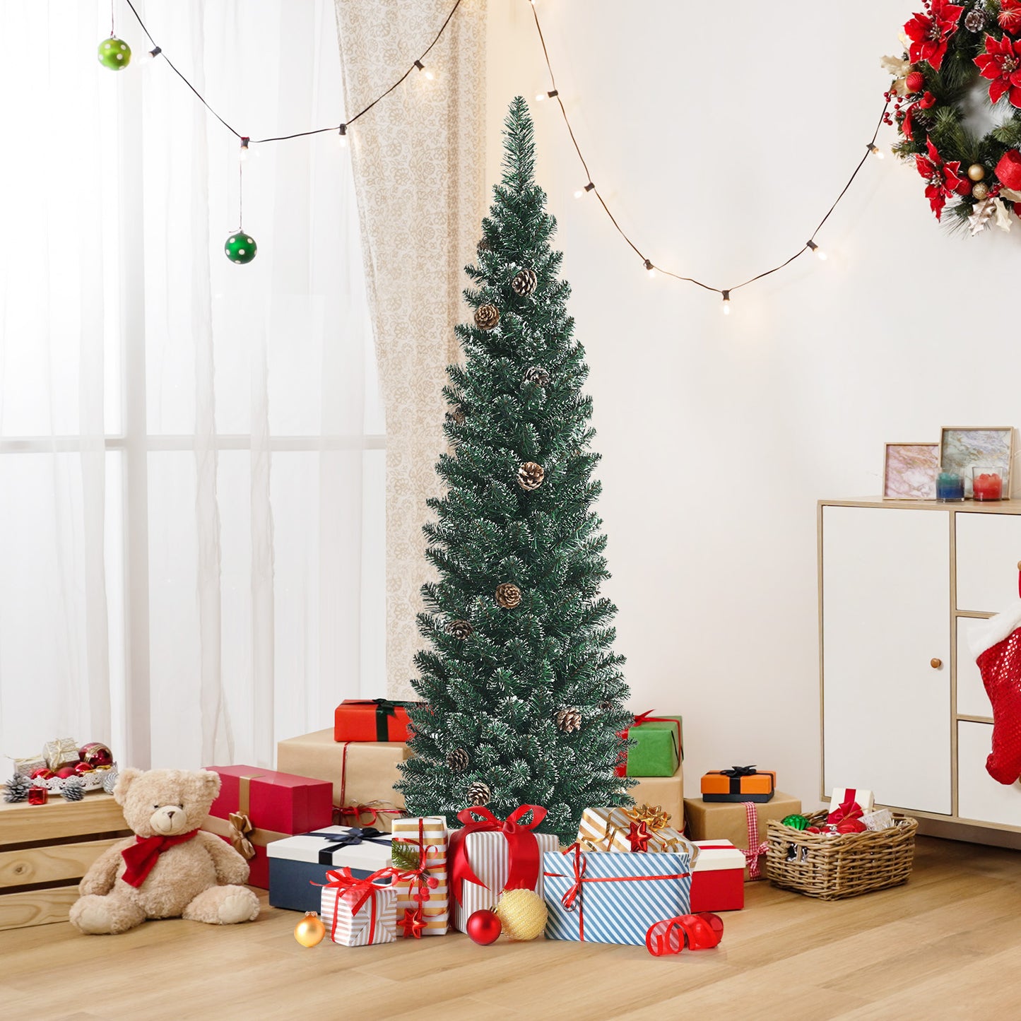 5-foot snowy artificial pencil Christmas tree with pine cones, holiday decor by Wilsons Home Store, perfect for festive decorations