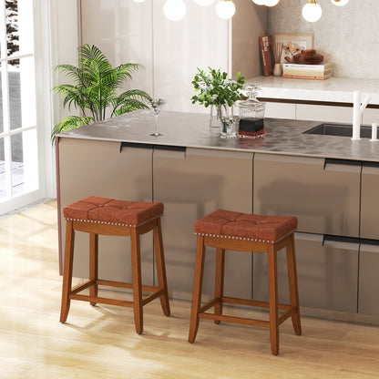 Set of 2 25-inch upholstered PU leather bar stools with saddle seats, perfect for kitchen and dining areas.