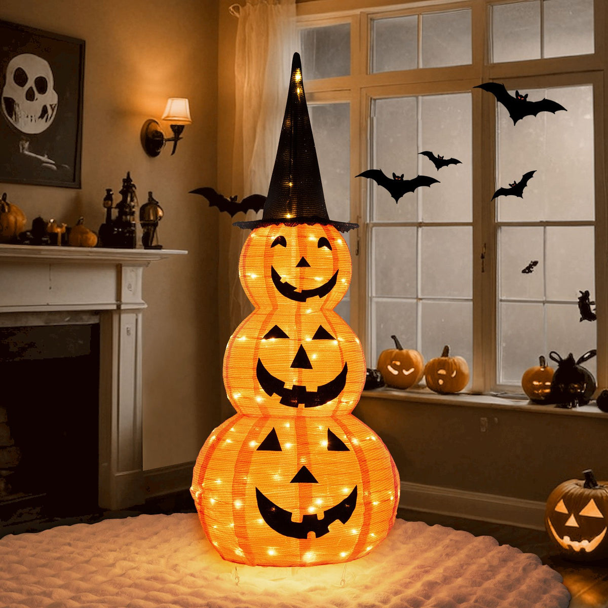5-foot lighted stacked pumpkins Halloween decoration with witch hat, perfect for spooky holiday decor, by Wilsons Home Store.