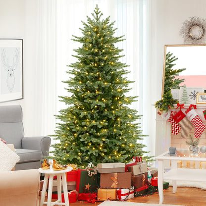 7-foot artificial Christmas tree with lush PVC branches and warm white LED lights, ideal for holiday decor.