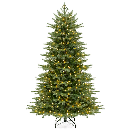 7-foot artificial Christmas tree with lush PVC branches and warm white LED lights, ideal for holiday decor.