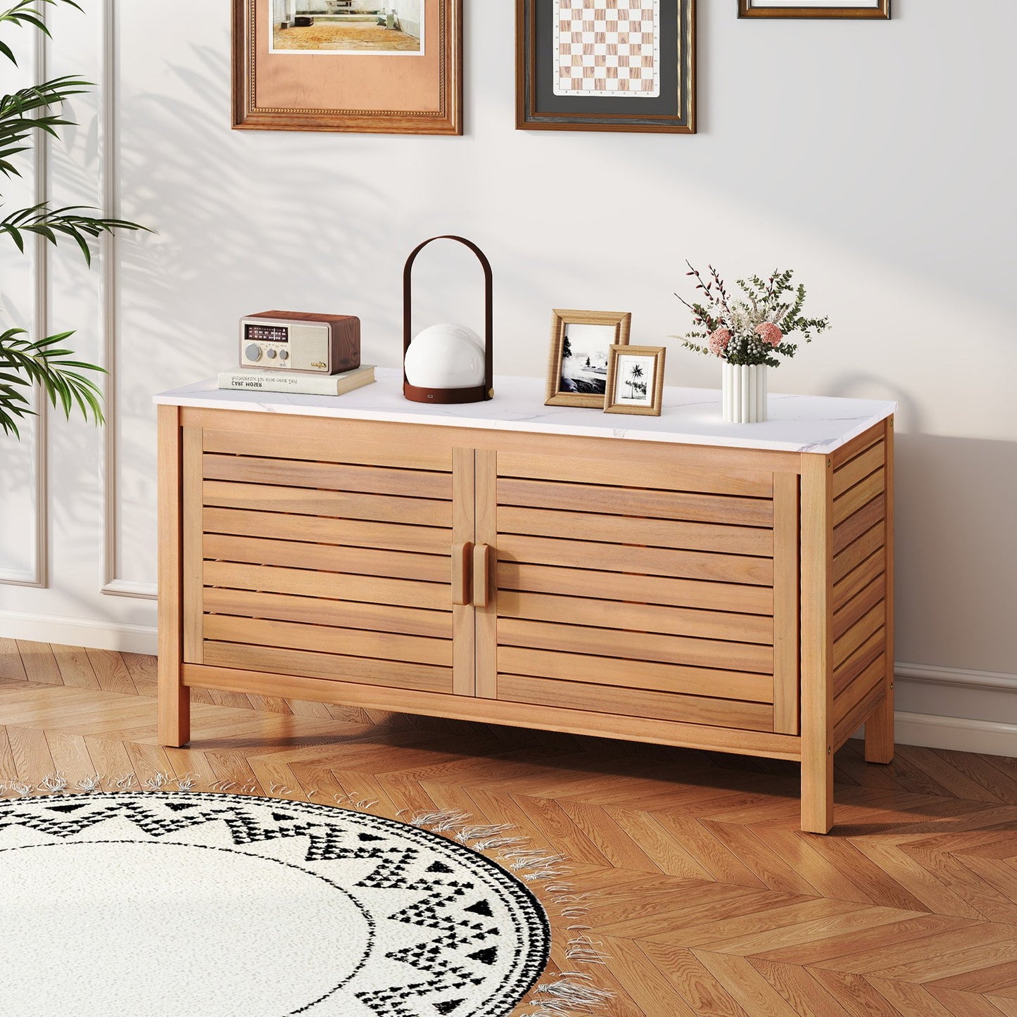 Outdoor patio storage cabinet with two doors, made of acacia wood and featuring a faux marble top for outdoor storage.
