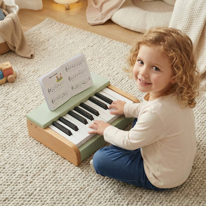 Green 18-key wooden kids' piano with removable music stand, colorful toy musical instrument for children.