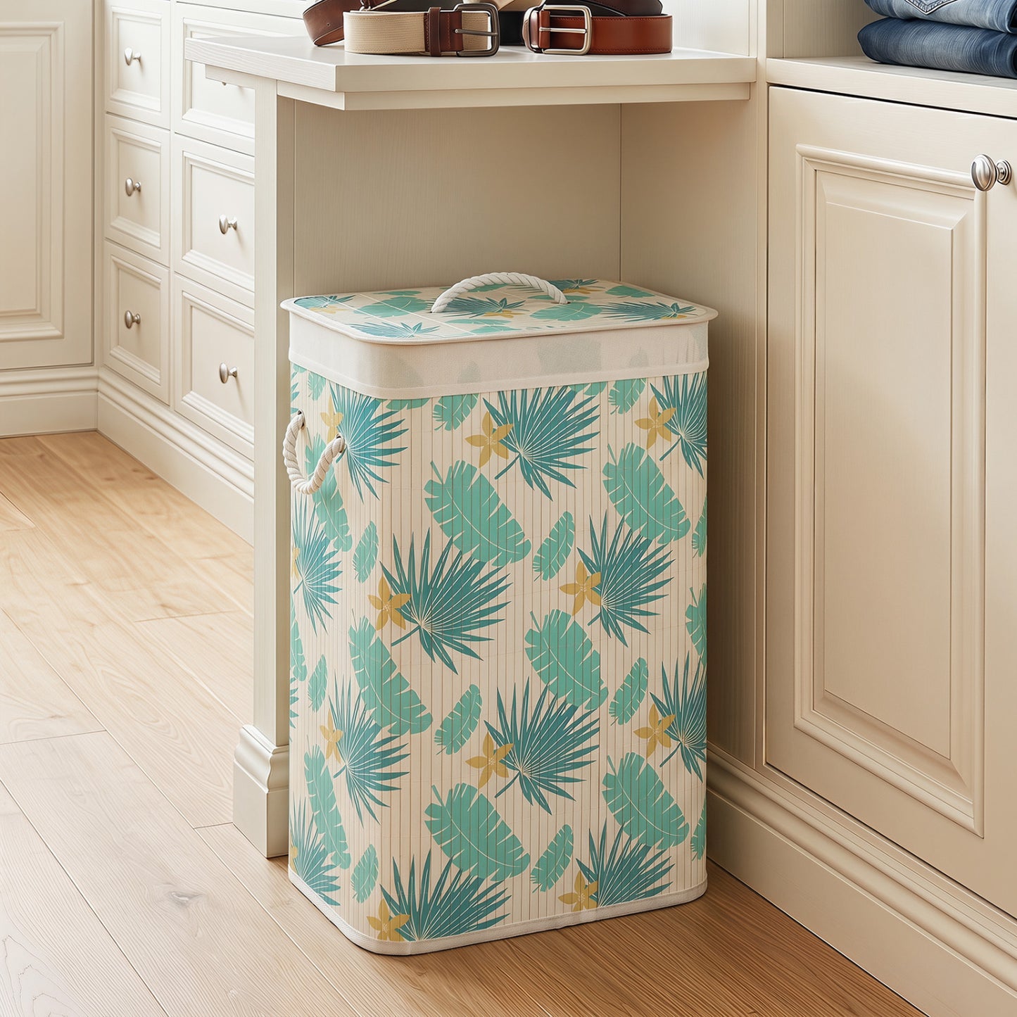 Green 19-gallon bamboo laundry hamper with removable liner and portable handles, ideal for bathroom or laundry room storage.