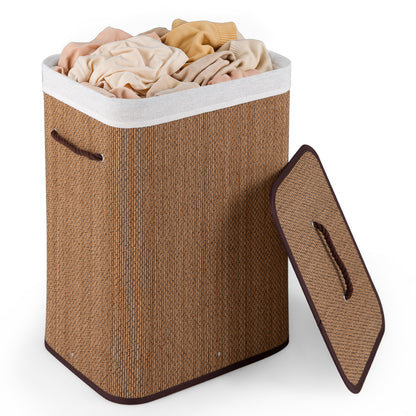 Black 19-gallon bamboo laundry hamper with removable liner and portable handles, perfect for organizing clothing and laundry.