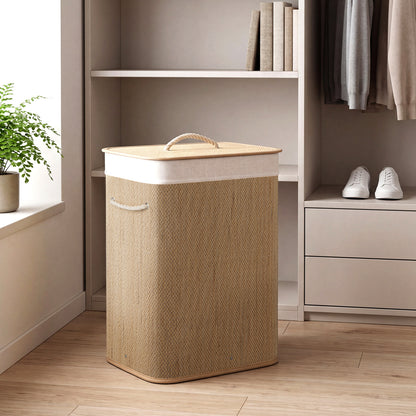 Black 19-gallon bamboo laundry hamper with removable liner and portable handles, perfect for organizing clothes in the bathroom.
