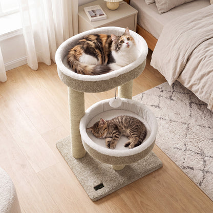 24-inch Wilsons Home Store cat tower with plush perches, scratching posts, and dangling ball for cats to climb and play.