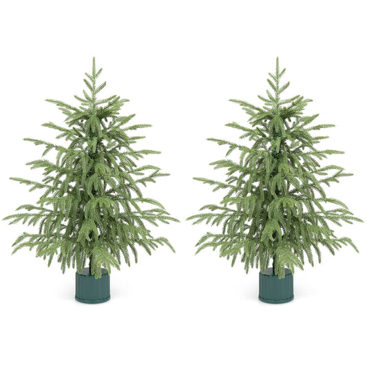Set of 2 24-inch pre-lit tabletop Christmas trees with rotating musical bases and PE branch tips, festive holiday decor.