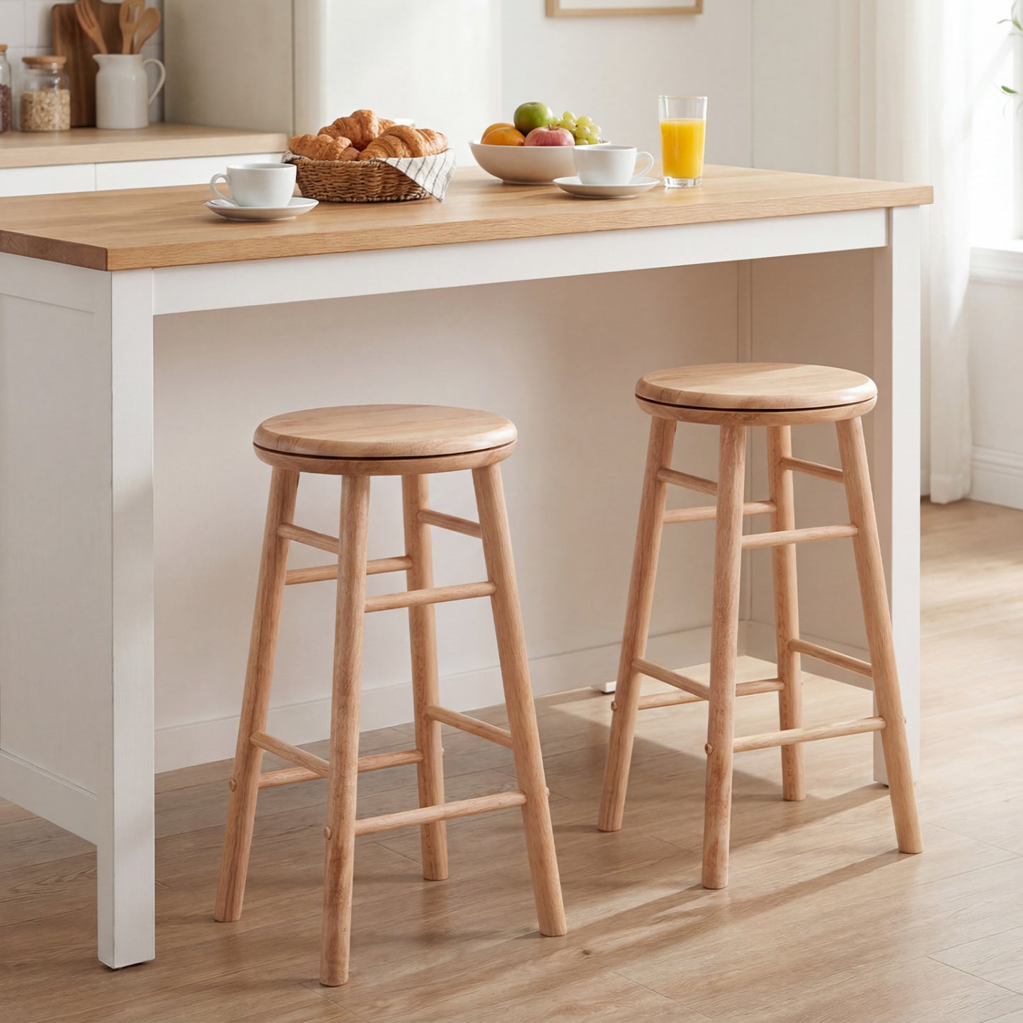 Set of two 24-inch gray swivel bar stools with footrests and crossbars, featuring modern kitchen and dining furniture design