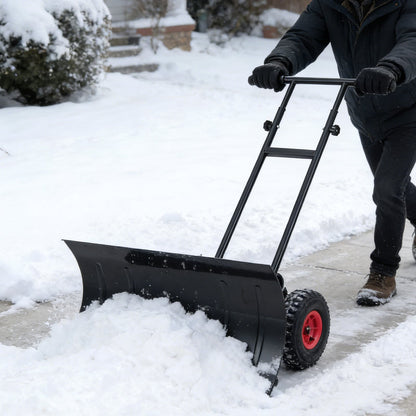 Heavy-duty 29-inch snow pusher with wheels, adjustable handle, and black metal blade for outdoor snow removal.