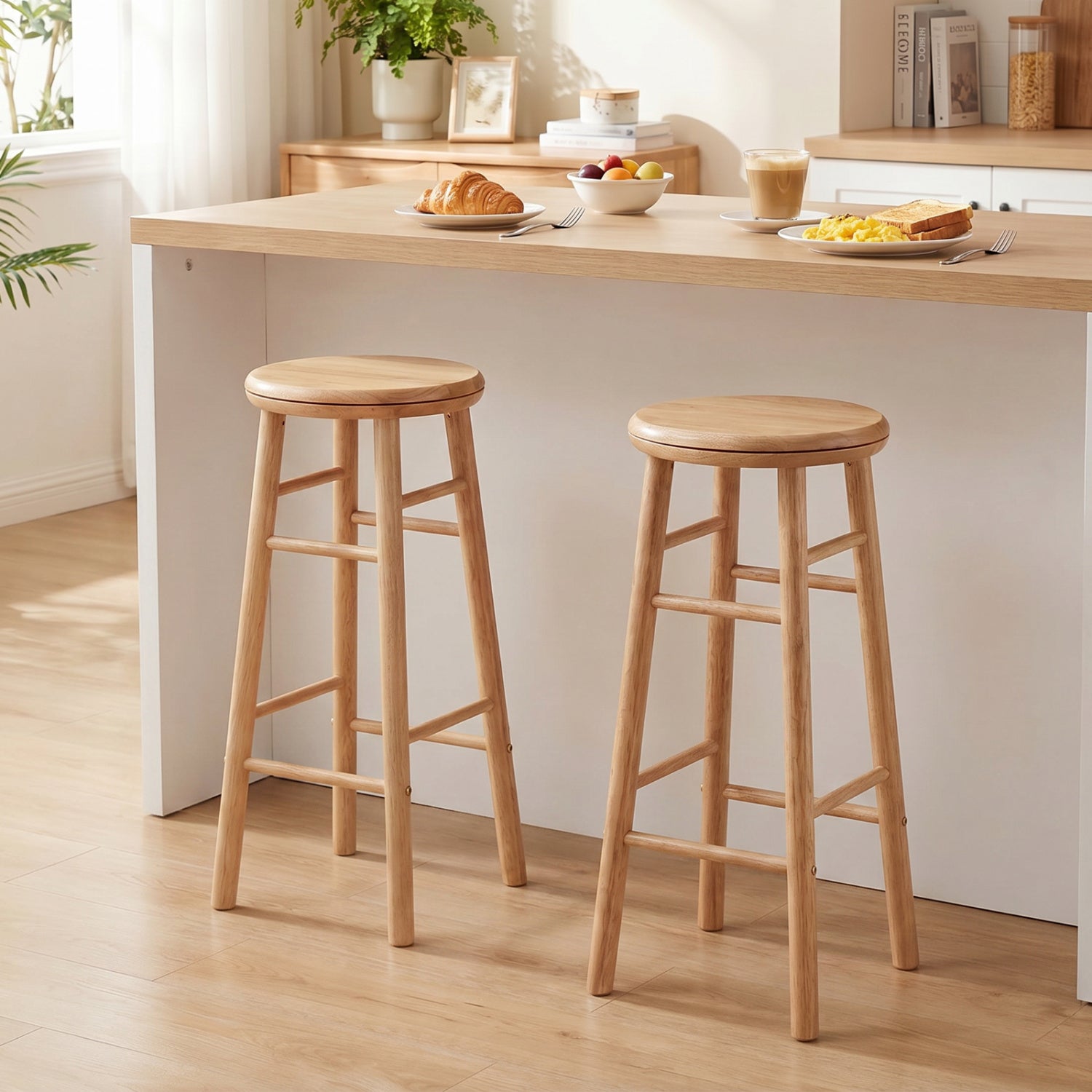 Set of 2 29-inch gray swivel bar stools with footrests and crossbars, ideal for kitchen and dining areas.