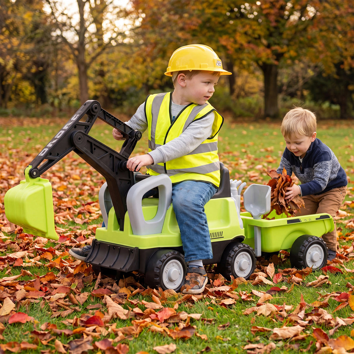Green 2-in-1 kids ride-on tractor with digging arm and detachable trailer, perfect for outdoor play and imaginative adventures.