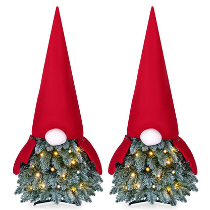 Two 2.5 ft pre-lit mini artificial Christmas trees with lights, ideal for tabletop holiday decor, by Wilsons Home Store.