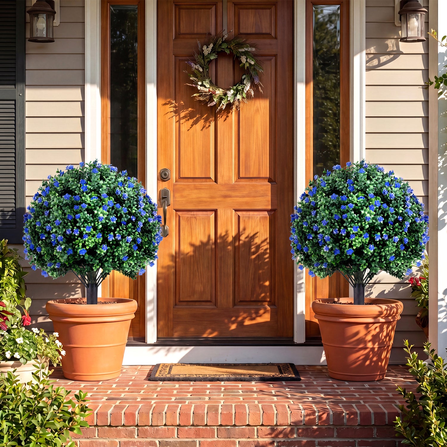 Two artificial camellia boxwood topiary ball trees, 27.5 inches tall, faux floral shrubs for decorative home accents.