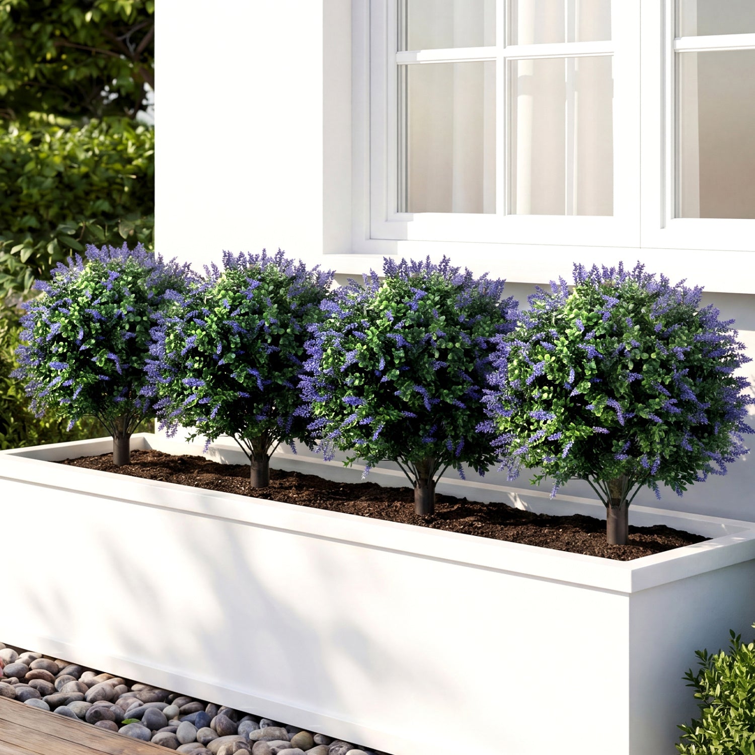 Two artificial lavender boxwood topiary ball trees with ground spikes, decorative faux plants for home or garden decor.