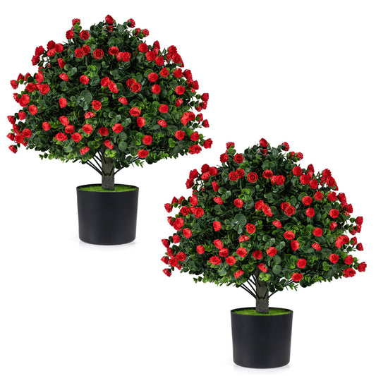Two artificial rose topiary ball trees in cement-filled flowerpots, decorative faux plants for home interior decor.