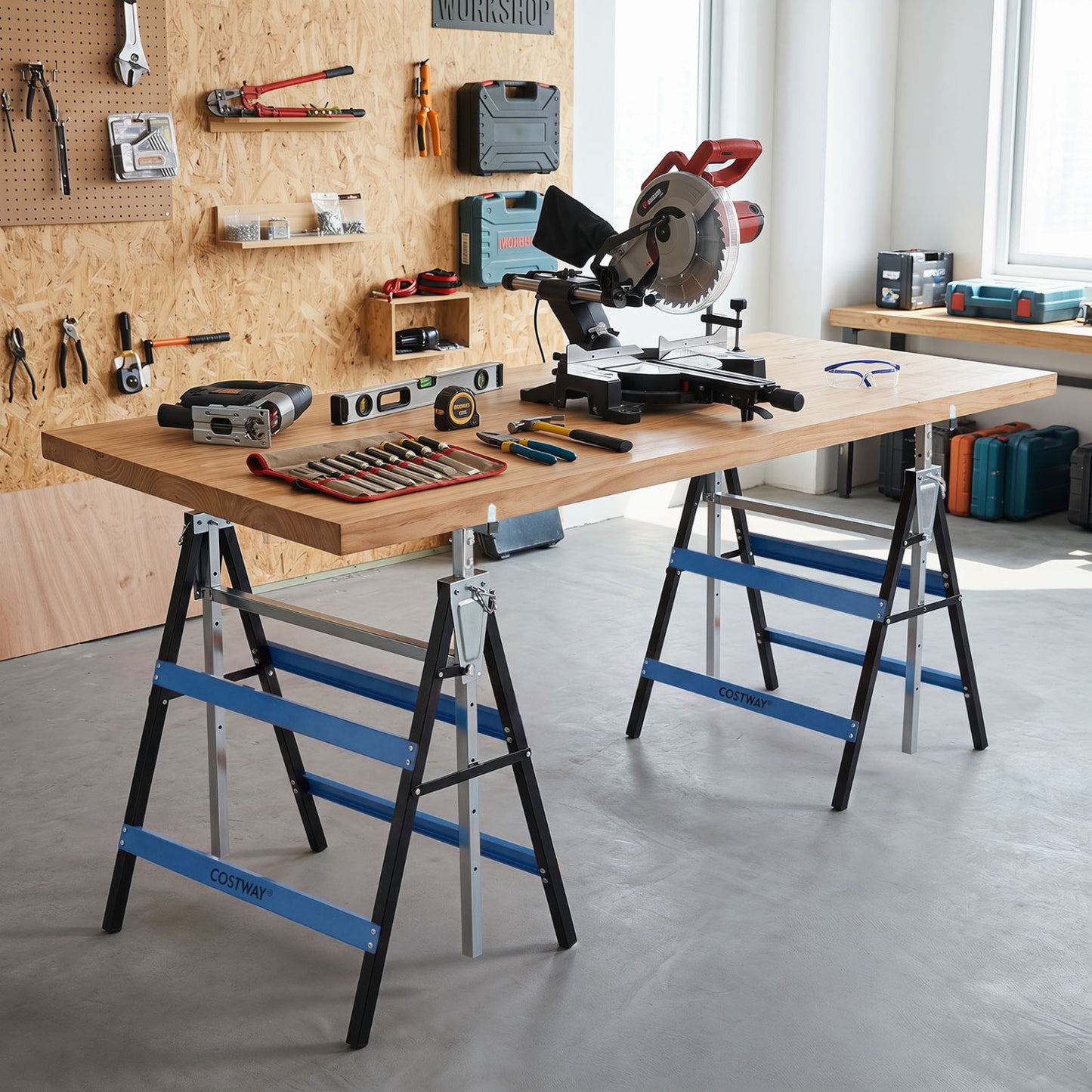 Two heavy-duty metal folding saw horses with adjustable height in blue, ideal for outdoor garage storage and work projects.