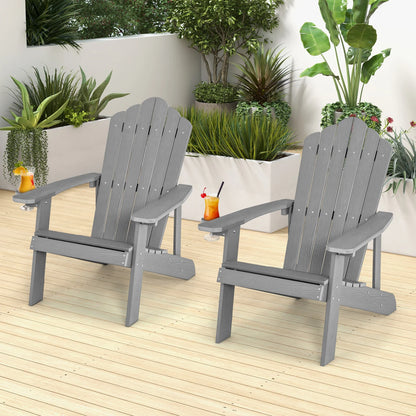 Two black Adirondack chairs set with ergonomic design for outdoor porch and backyard seating, outdoor patio furniture.