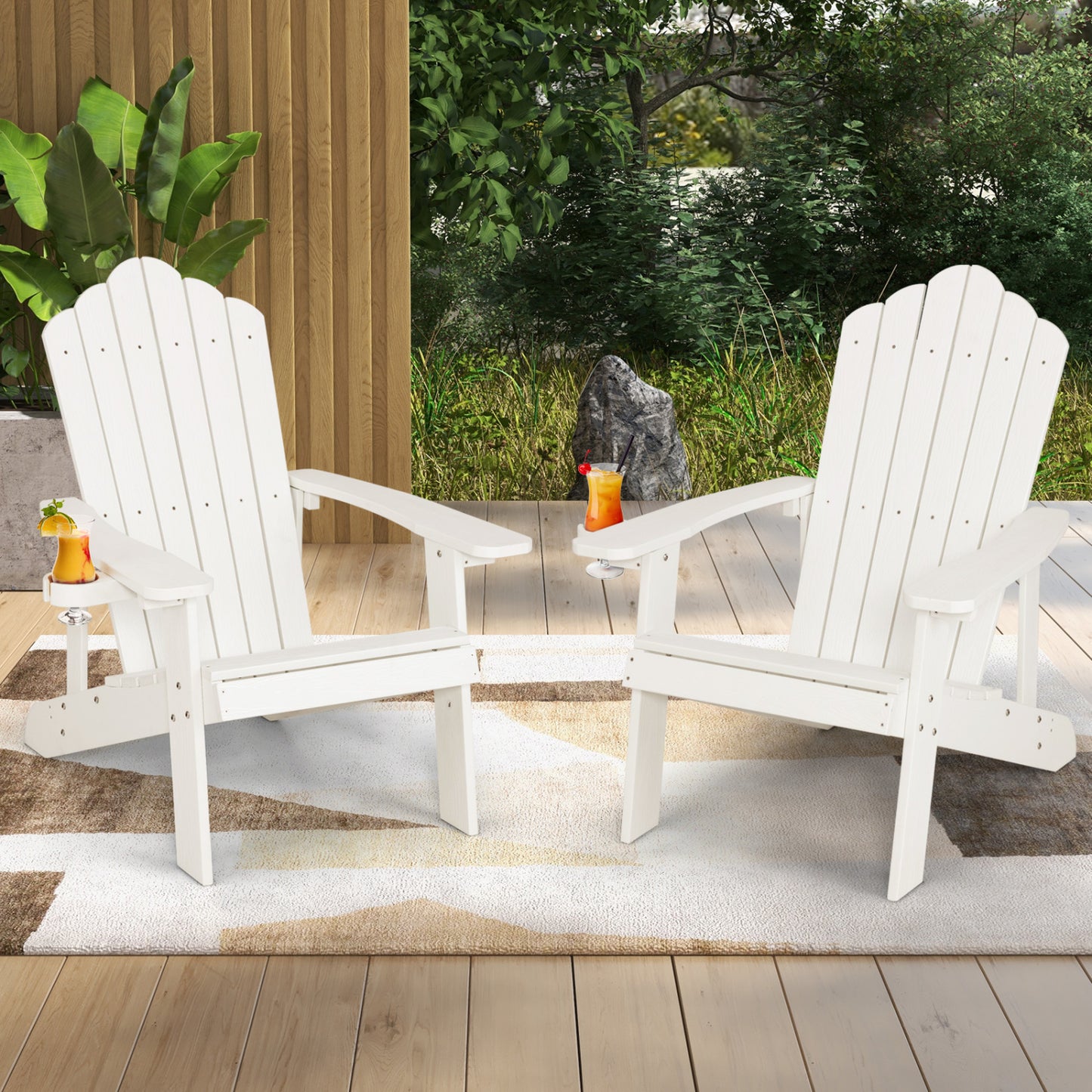 Two black Adirondack chairs from Wilsons Home Store, ergonomic outdoor seating set for porch and backyard relaxation.