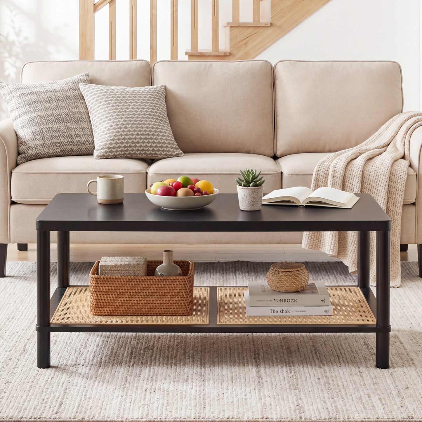 Black 2-tier boho coffee table with rubber wood frame and PVC rattan shelf, ideal for living room center table.